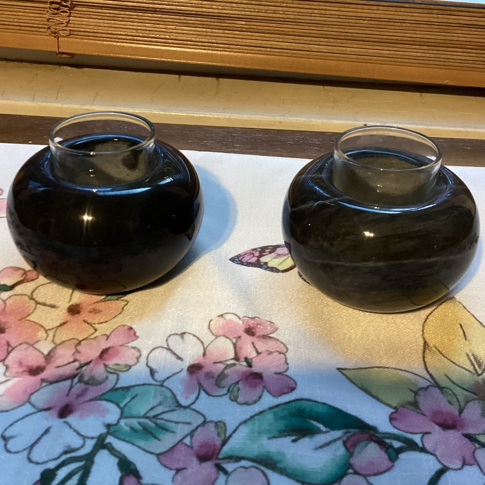 Pair of Claire Burke marble votive holders
